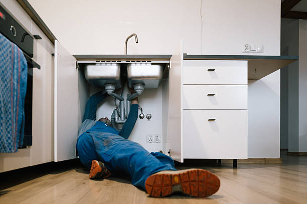 Professional Emergency Plumber technician working in Strausstown, PA